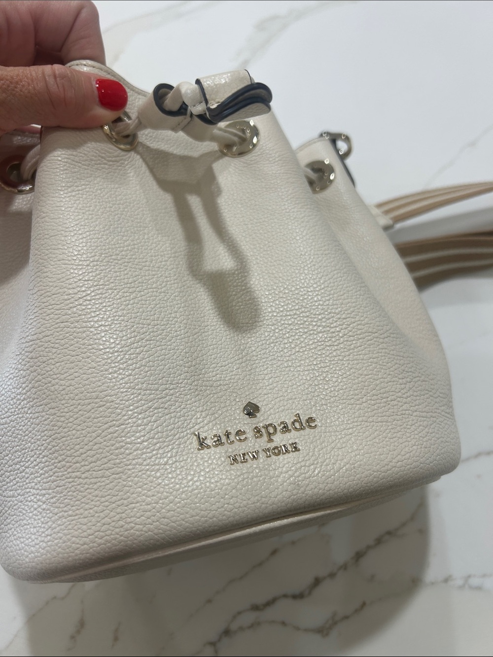 kate spade Cream Pebbled Leather Drawstring Crossbody with Striped Strap - Picture 5 of 7